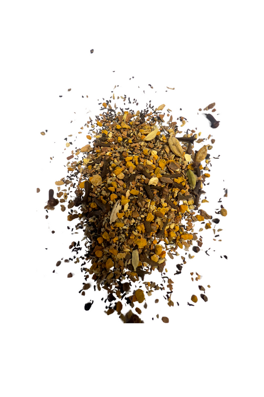 Premium Indian black tea blended with turmeric, ginger, cardamom, cinnamon, anise, cloves, and black pepper for a warm, spiced infusion